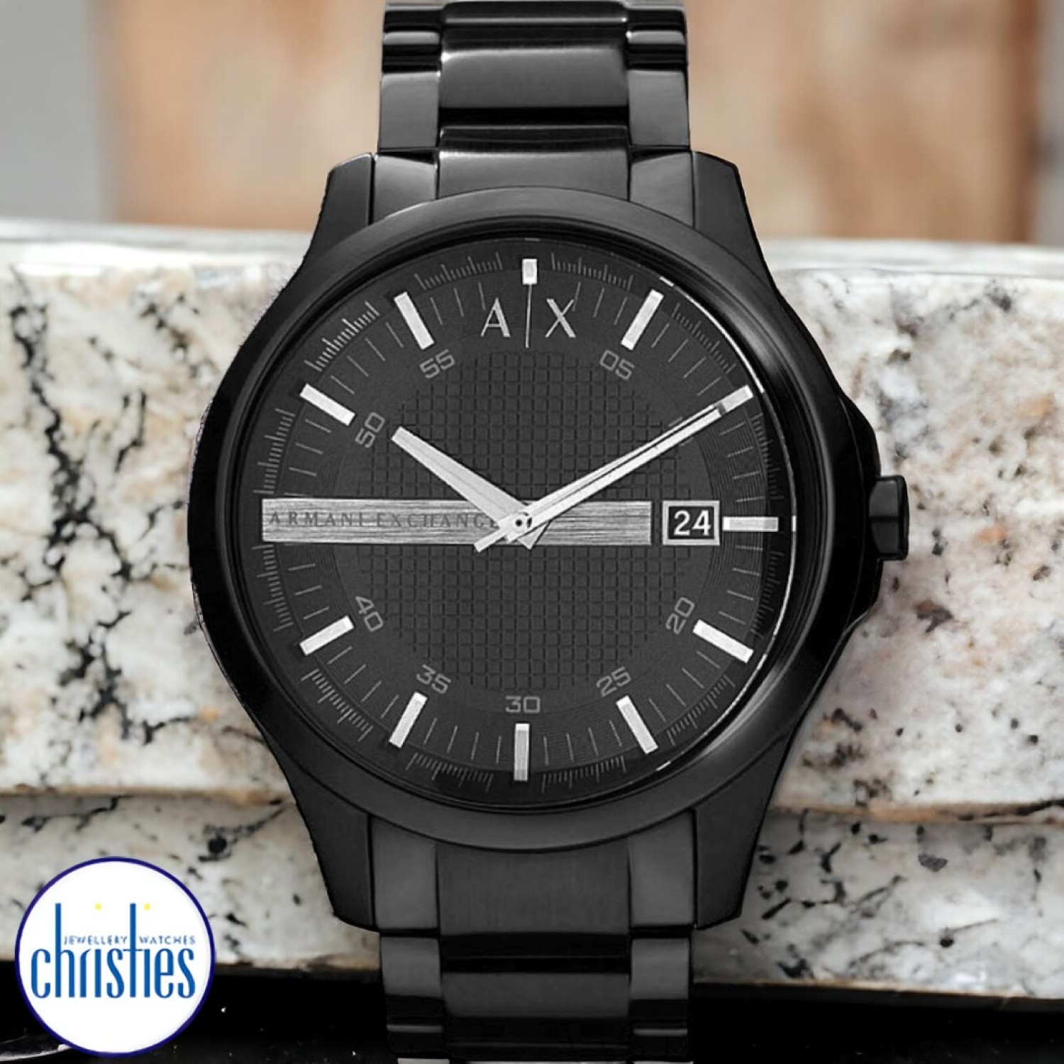 AX2104 A|X  Armani Exchange Watch. The stylish AX2104  mens Armani Exchange watch in Black IP plated stainless steel features a 47mm case and centred on a black dial with silver baton hour markers and date function. The watch is fitted with quar @christie