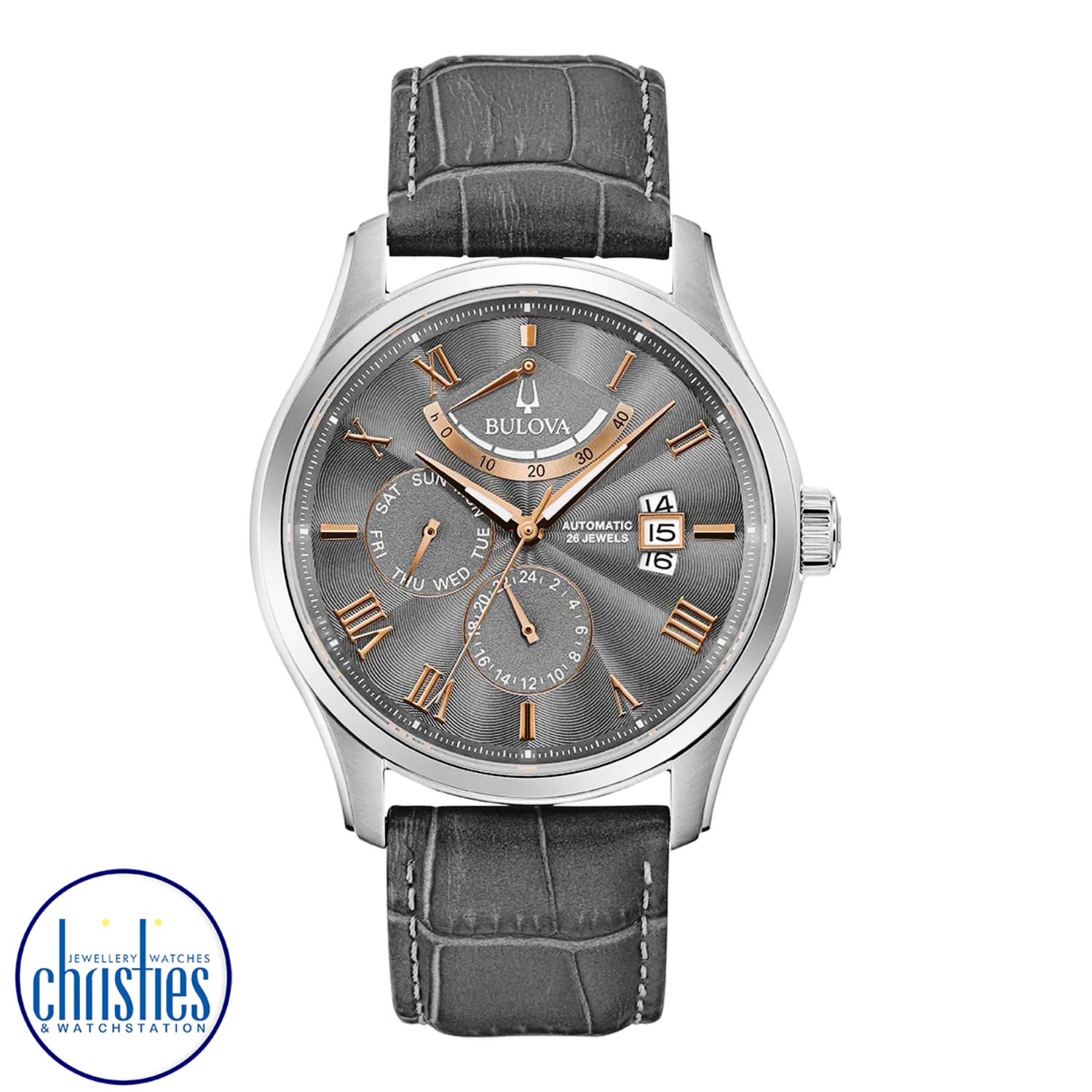 96C143 Bulova Men's Classic Automatic Watch. This watch boasts a stainless steel screw-back case and a gray six-hand dial with rose gold-tone Roman numerals and markers, and a 40-hour power reserve indicator at the 12 o'clock position.