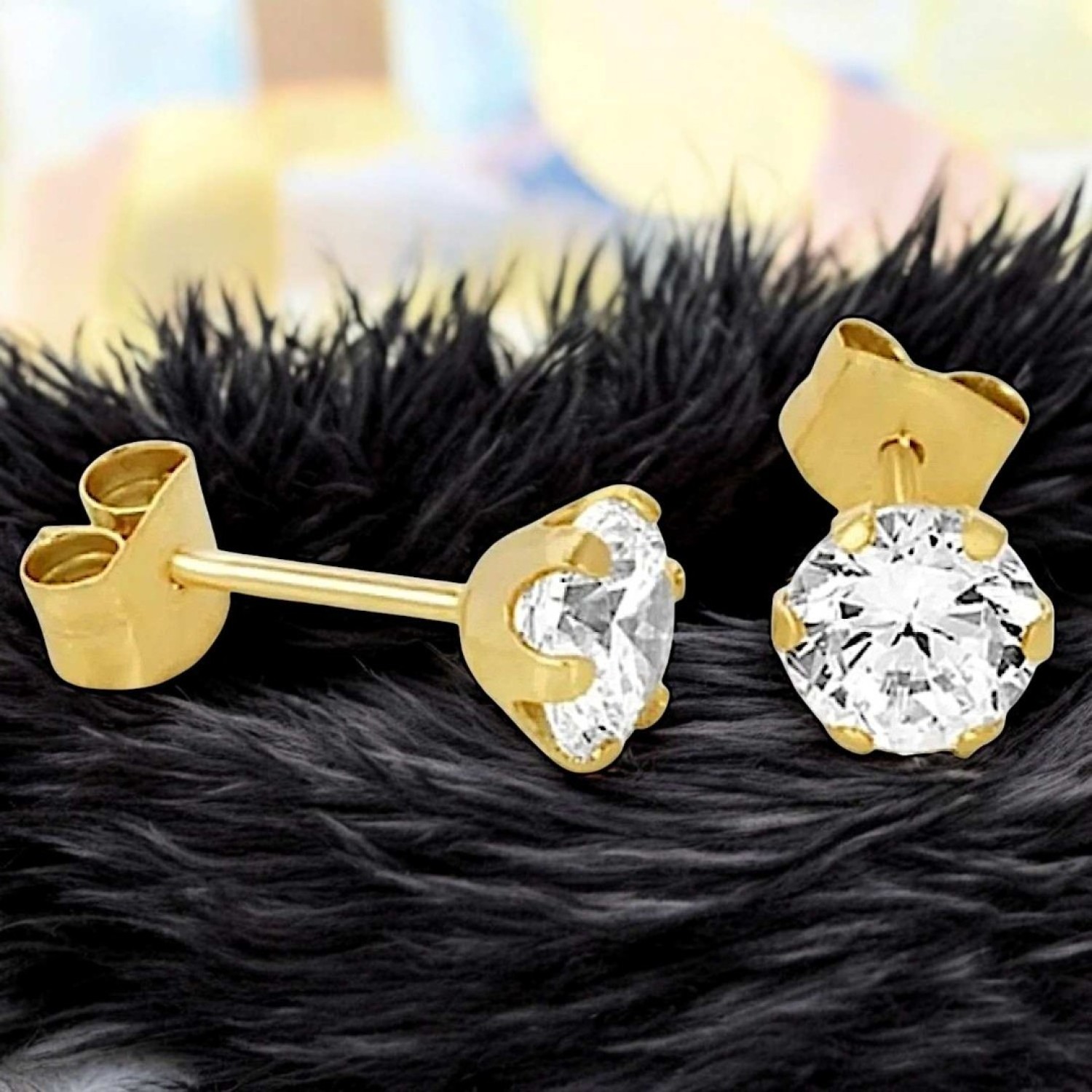 9ct 6 Claw Cubic Zirconia Stud Earrings – Elegant Gold Jewelry by Christies Jewellery NZ 9ct gold stud earrings featuring a sparkling round-cut cubic zirconia gemstone in a six-claw setting