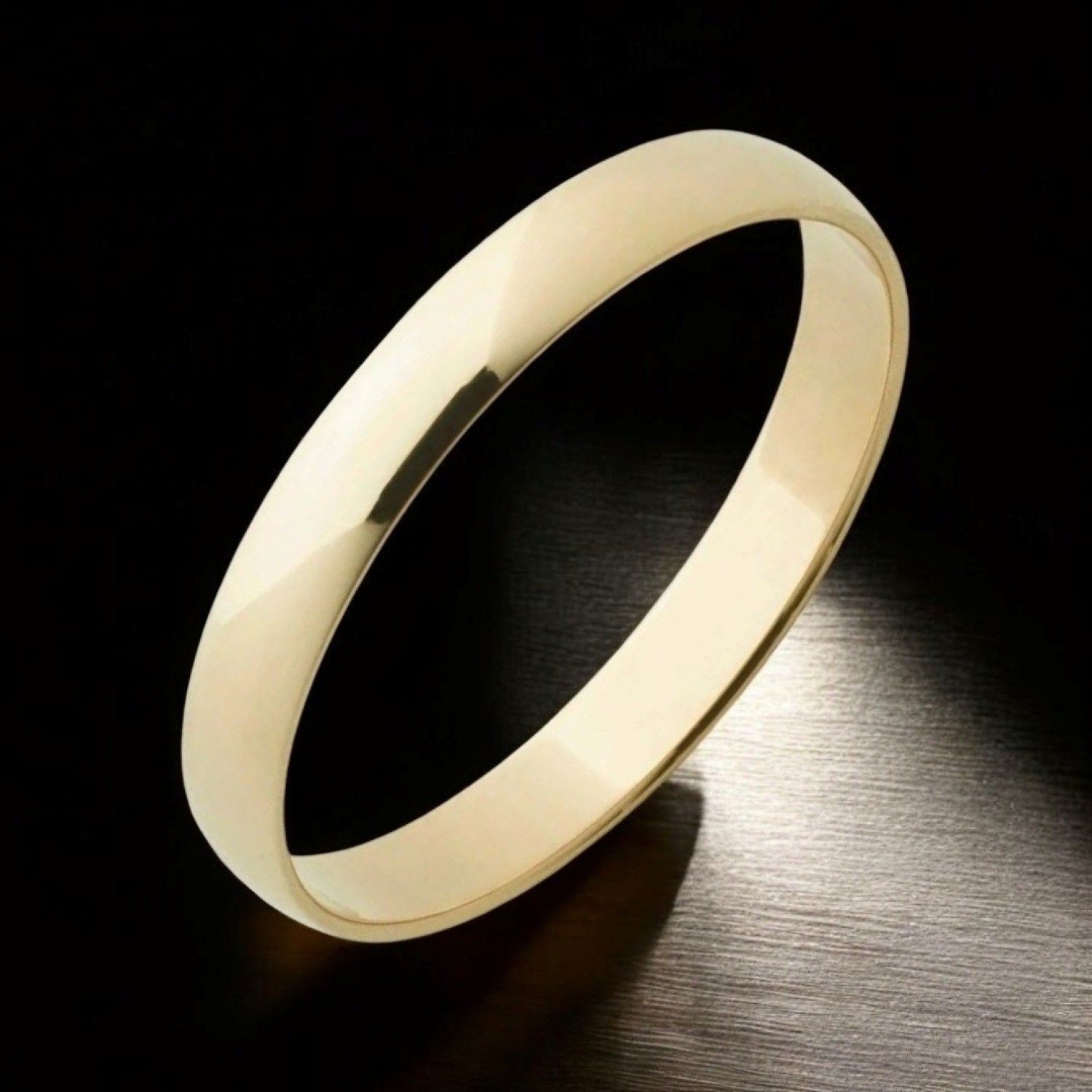 Elegant 9ct Yellow Gold Wedding Ring - 4mm Width Elegant 9ct Yellow Gold Wedding Ring with a smooth, polished surface and a width of 4mm, showcasing timeless beauty and durability.
