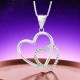 Elegant Double Heart Pendant – A Classic Symbol of Love & Connection Elegant Double Heart Pendant featuring two intertwined hearts—one adorned with shimmering stones, the other with a sleek polished finish, suspended from a delicate box chain.