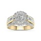 18ct Gold Diamond Ring RE27771 | Elegant 18ct Gold Diamond Ring featuring a central round diamond, surrounded by a halo of smaller diamonds and adorned with rows of baguette-cut and round diamonds on a split band.