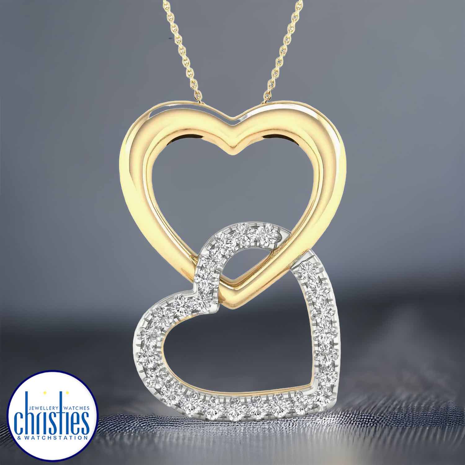 This 9ct yellow gold diamond set twin heart pendant is a true symbol of love and affection. This pendant is sure to take their breath away, boasting 25 sparkling diamonds with a total diamond weight of 0.15ct. 