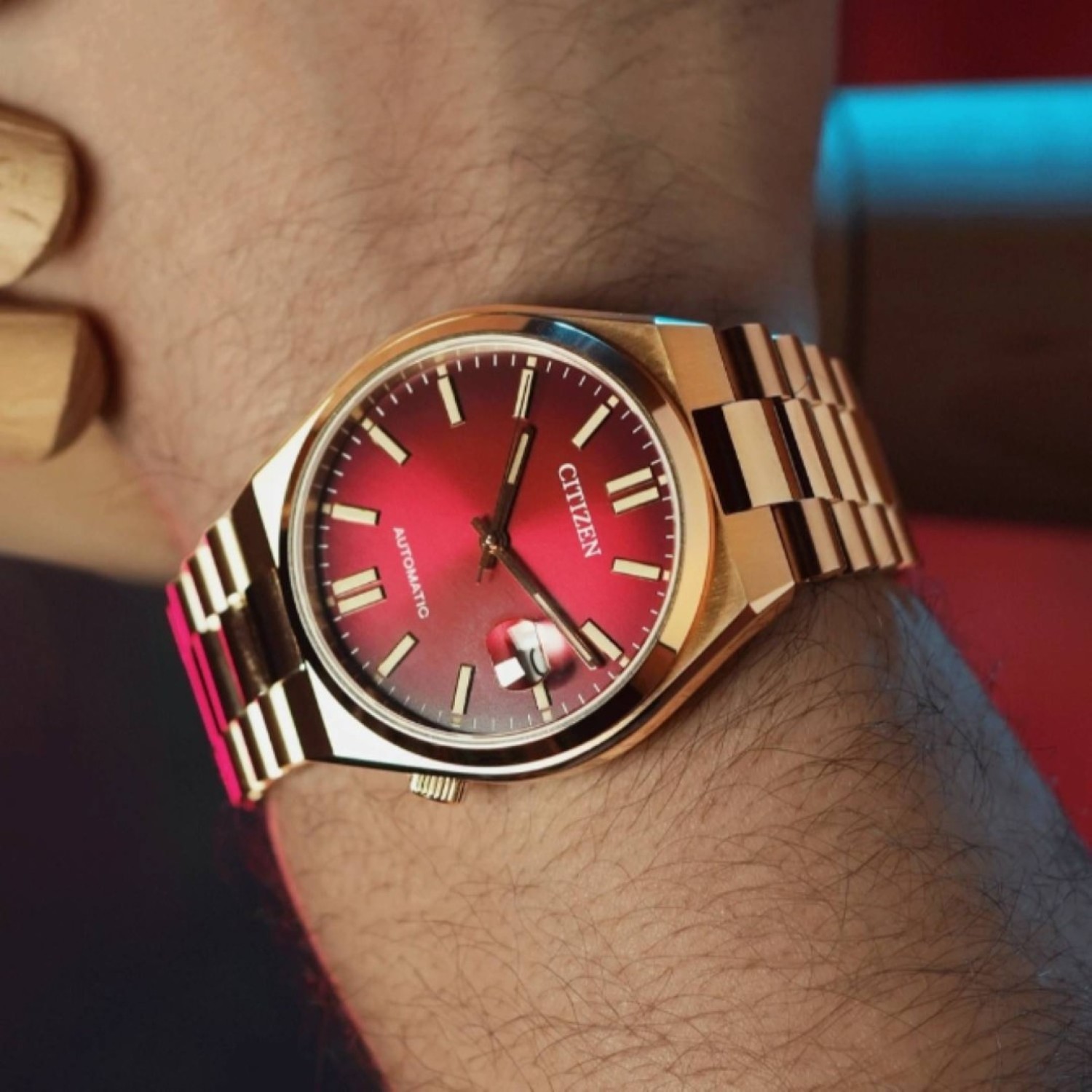 Christies Jewellery - NJ0153-82X Citizen Automatic Gold Tone Watch Watches Auckland NZ NJ0153-82X Citizen Automatic Gold Tone Watch with Red Dial
