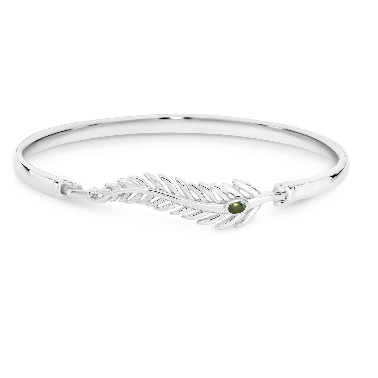 Pounamu and Silver Fern Bangle. NZ Pounamu or Greenstone bangle featuring the silver fern Set with NZ Greenstone Crafted in Sterling Silver  Gift Boxed 5 Year Written Guarantee Oxipay is simply the easier way to pay - use Oxipay and well spr @christies.on