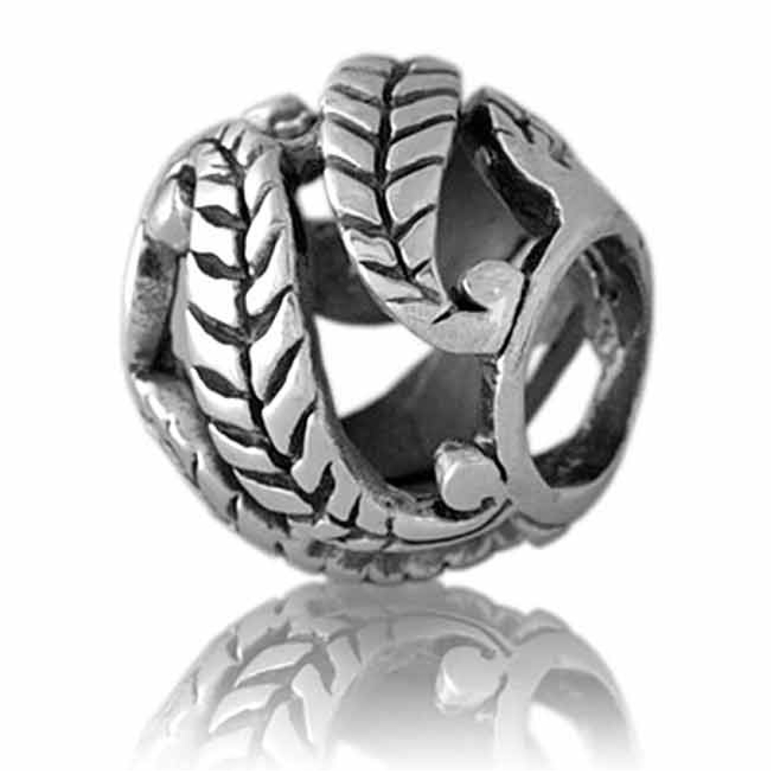 LK087 Evolve Charms Forever. Evolve New Zealand Forever Charm A series of fern fronds embraced in a continuous spiral of new beginnings and growth representing the cycle of life within which there are many friends, family and relationships that we t @chri