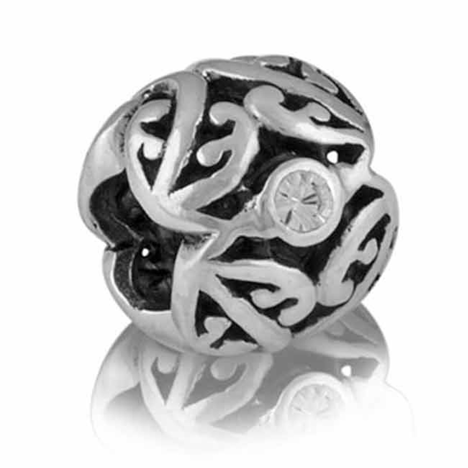 LK136 Evolve Charms CZ Family Tree. Evolve New Zealand LK136 Evolve Charms CZ Family Tree Our beautiful Family Tree charm is inspired by the iconic Maori Kowhaiwhai patterns, which often adorn the rafters of whare (Maori meeting houses) in honour of celeb