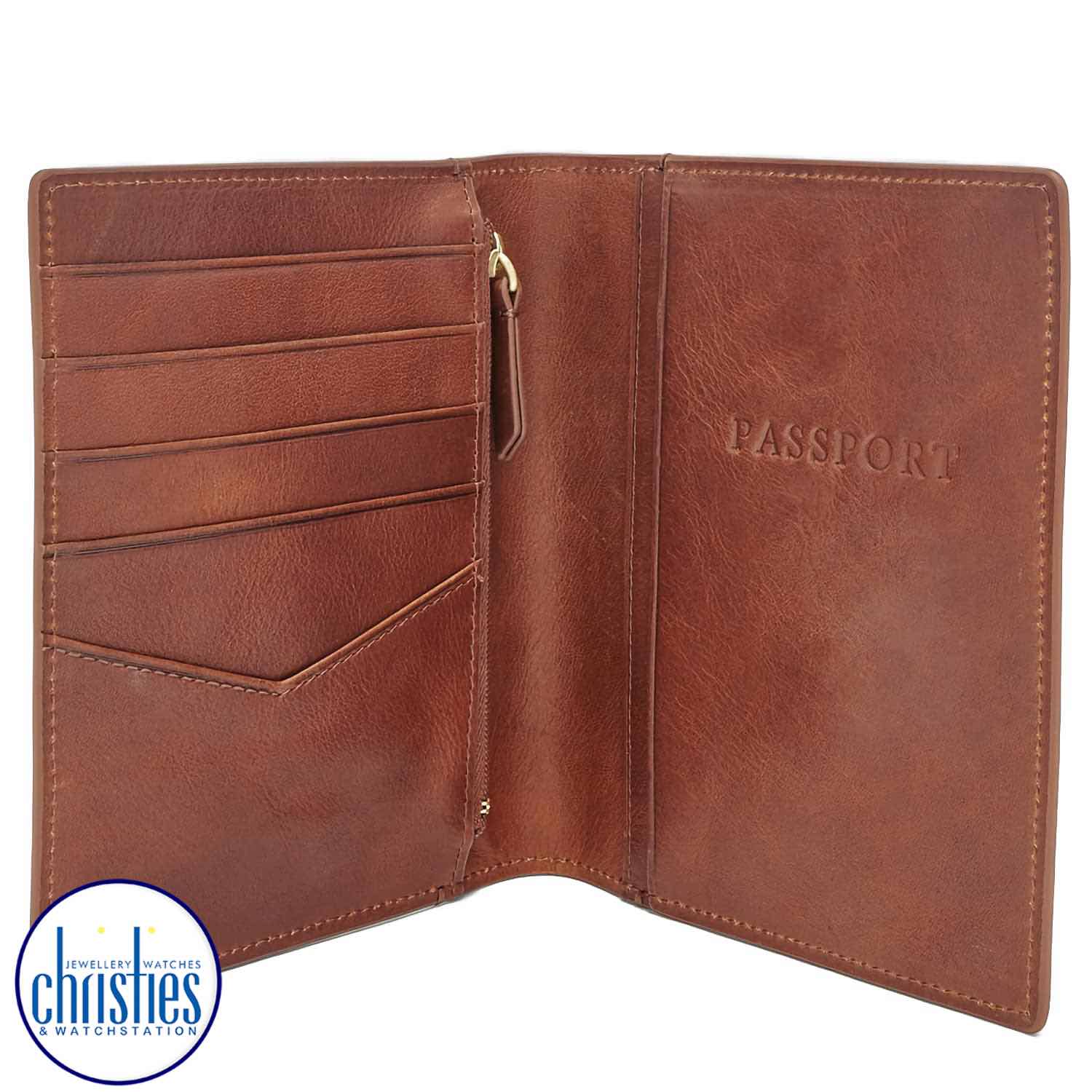 MLG0358222 Fossil Leather RFID Passport Case Cognac. This Fossil passport case features RFID blocking protecting your contents from electric charges.