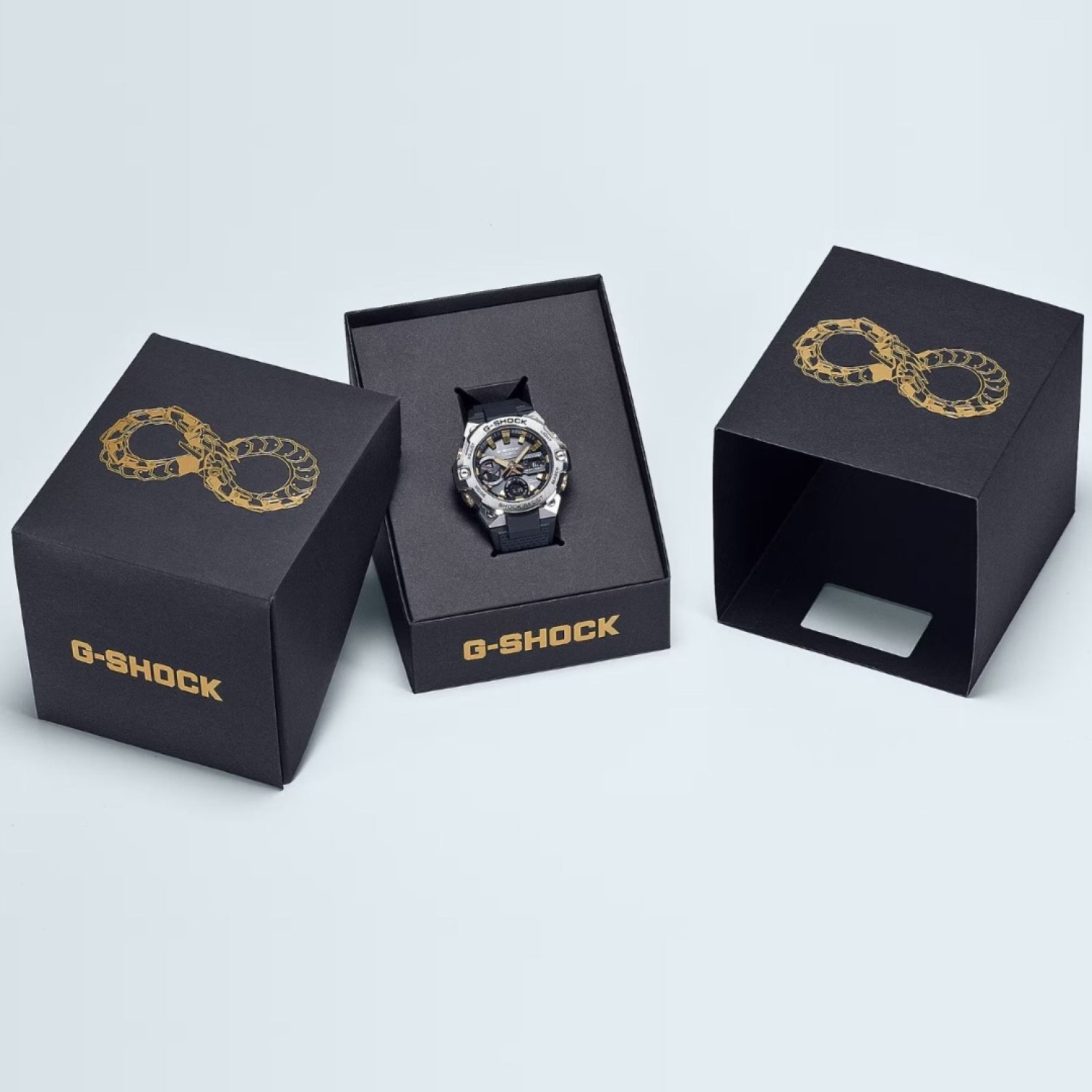 "GSTB400CX-1A Casio G-Shock G-STEEL Watch – Year of the Snake Special Edition GSTB400CX-1A Casio G-Shock G-STEEL Watch with a silver metal bezel, black dial, gold accents, and snake-pattern details inspired by the Year of the Snake. Features shock resistance, solar power, Bluetooth connectivity, and a durable resin band.