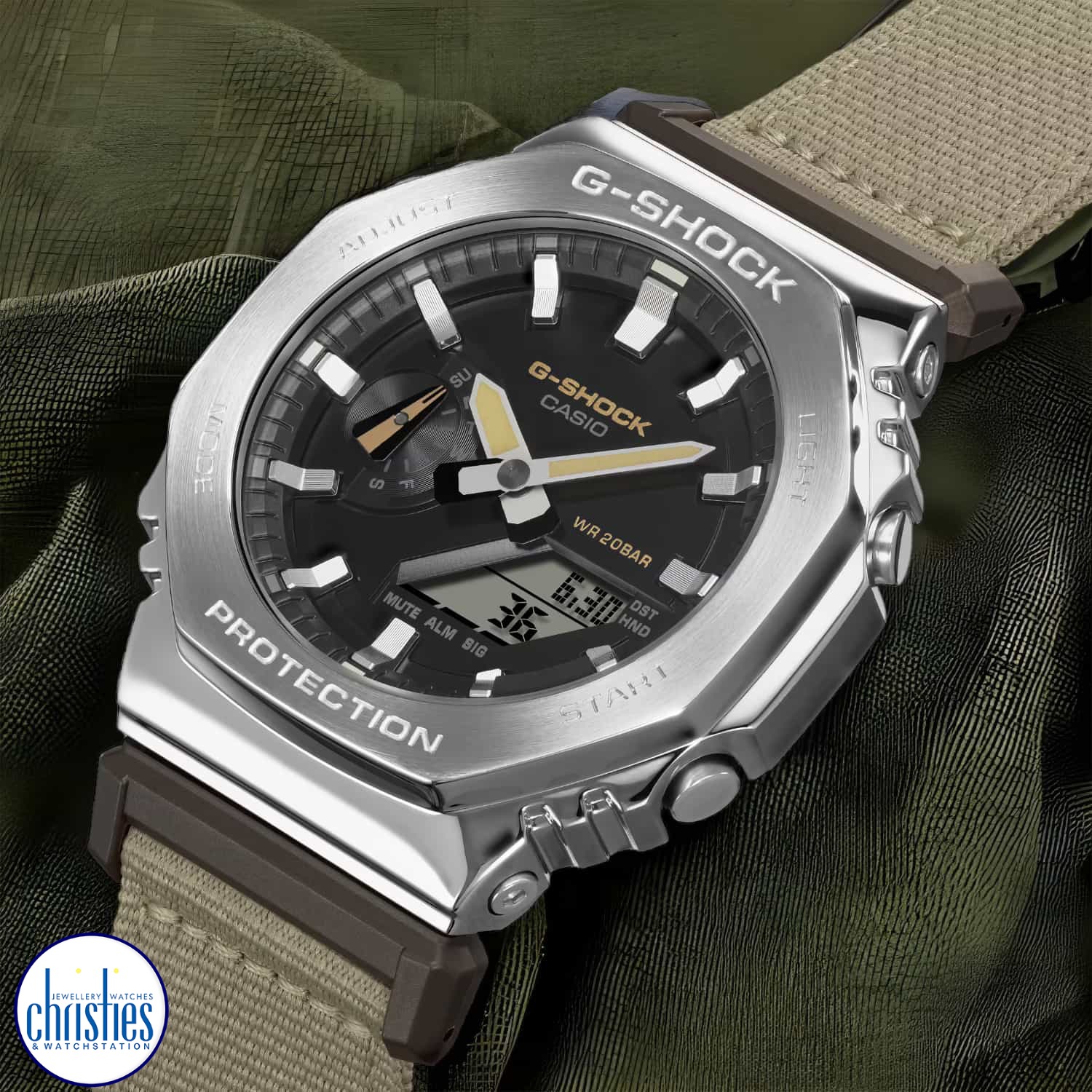 Christies Jewellery - GM2100C-5A G-Shock Military Field Watch Style with Cloth Band Watch GM2100C-5A G-Shock Military Field Watch Style with Cloth Band Watch. Experience the GM2100C-5A G-Shock Military Field Watch Style with Cloth Band Watch, now available at Christies.
