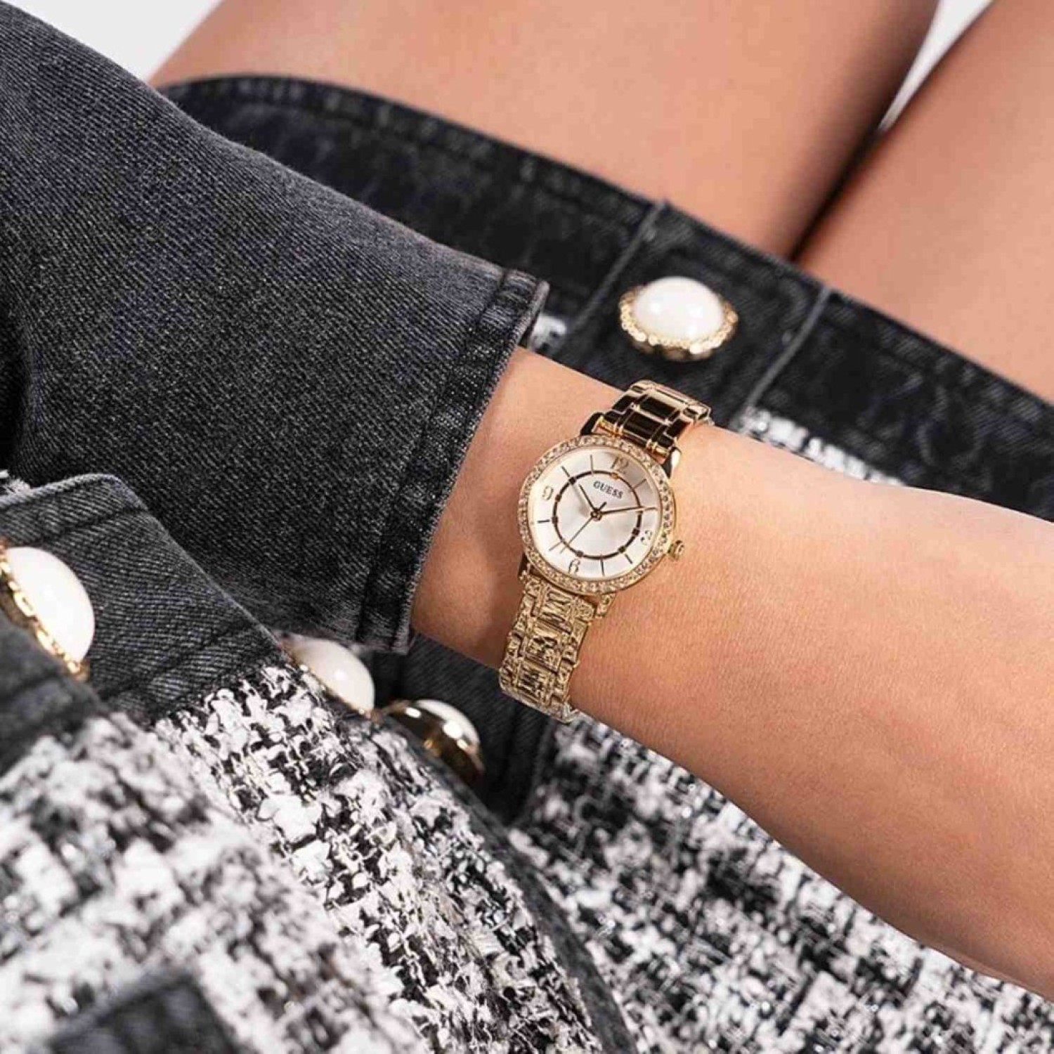 GW0468L2 GUESS Ladies Gold Tone Analogue Watch GW0468L2 GUESS Ladies Gold Tone Analogue Watch | Gold GUESS women's wristwatch featuring a white dial, crystal-adorned bezel, gold-tone hour markers, and a gold stainless steel link bracelet.