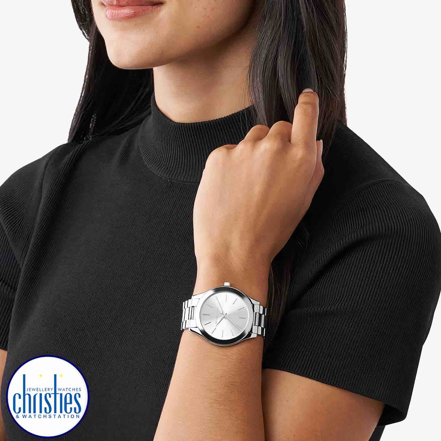 MK3178 Michael Kors Slim Runway Silver Watch.   A perennial favourite, Michael Kors iconic Slim Runway watch is designed in silver tone stainless steel and features a sleek, understated dial for a modern touch. Stack it with an arm full of bracelets for y
