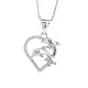 Dolphin Heart Pendant – Christies Jewellery NZ- Christies Jewellery Online and Auckland Dolphin Heart Pendant by Christies Jewellery NZ | A silver heart-shaped pendant featuring two intertwined dolphins, accented with small sparkling stones, hanging from a delicate chain.