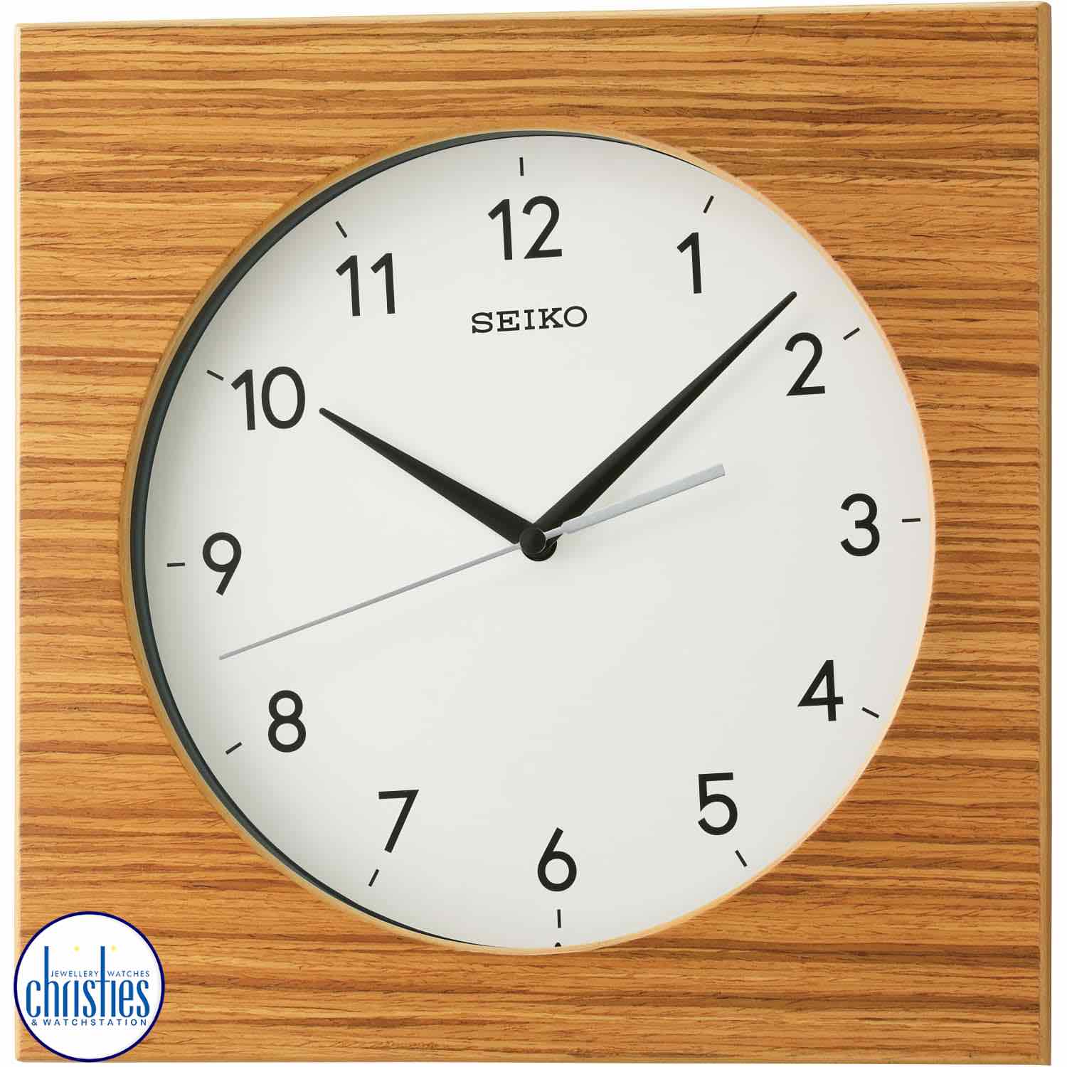 QXA766-B Seiko Wall Clock Zebra Wood Veneer. The SEIKO WALL CLOCK QXA766-B is a stylish and functional addition to any home or office.