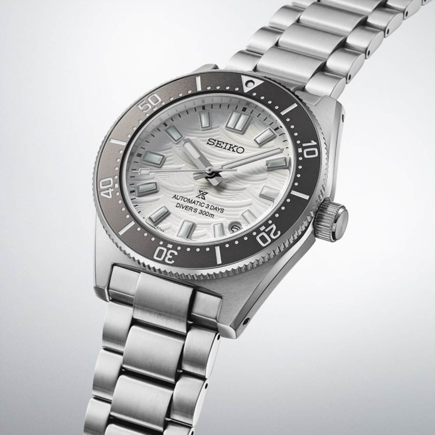Elegant and Functional SPB511J SEIKO Prospex Automatic Divers Watch SPB511J SEIKO Prospex Automatic Divers Watch with a stainless steel bracelet and case, featuring a silver dial with a unique texture, luminescent hour markers and hands, a rotating bezel with minute indicators, and water resistance up to 300 meters.