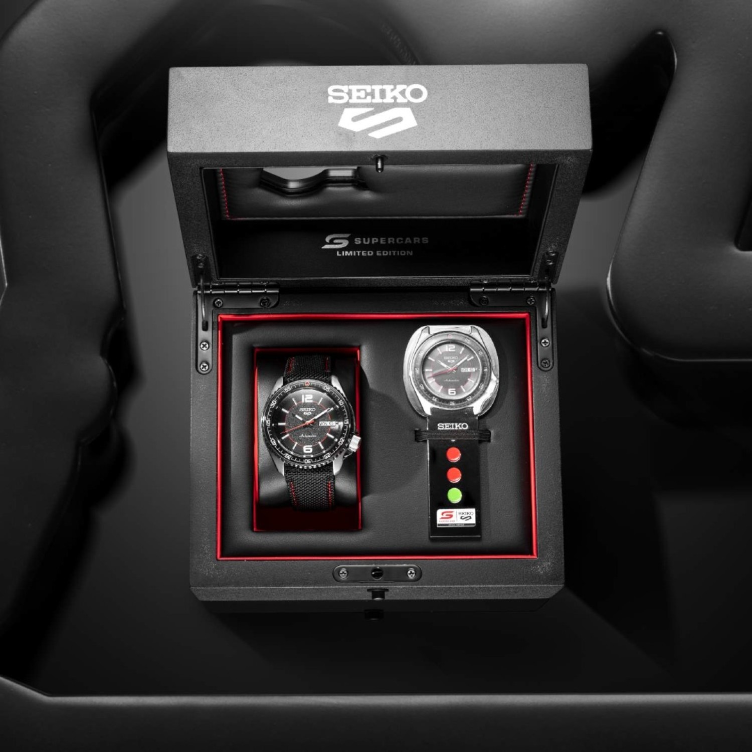 SRPL54K Seiko 5 Sports Supercars Limited Edition 2025 – Bold Design with Racing-Inspired Details SRPL54K Seiko 5 Sports Supercars Limited Edition 2025 by Seiko Watches NZ | SRPL54K Seiko 5 Sports Supercars Limited Edition 2025 watch featuring a bold textured dial resembling racing asphalt, accented with red detailing, a day-date display, and a sleek