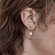 Tiny Stolen Heart Earrings – Stolen Girlfriends Club Jewellery Tiny Stolen Heart Earrings by Stolen Girlfriends Club Jewellery | A pair of heart-shaped stud earrings with the word 'STOLEN' engraved on the front of each heart.