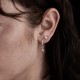 Tiny Stolen Heart Earrings – Stolen Girlfriends Club Jewellery Tiny Stolen Heart Earrings by Stolen Girlfriends Club Jewellery | A pair of heart-shaped stud earrings with the word 'STOLEN' engraved on the front of each heart.