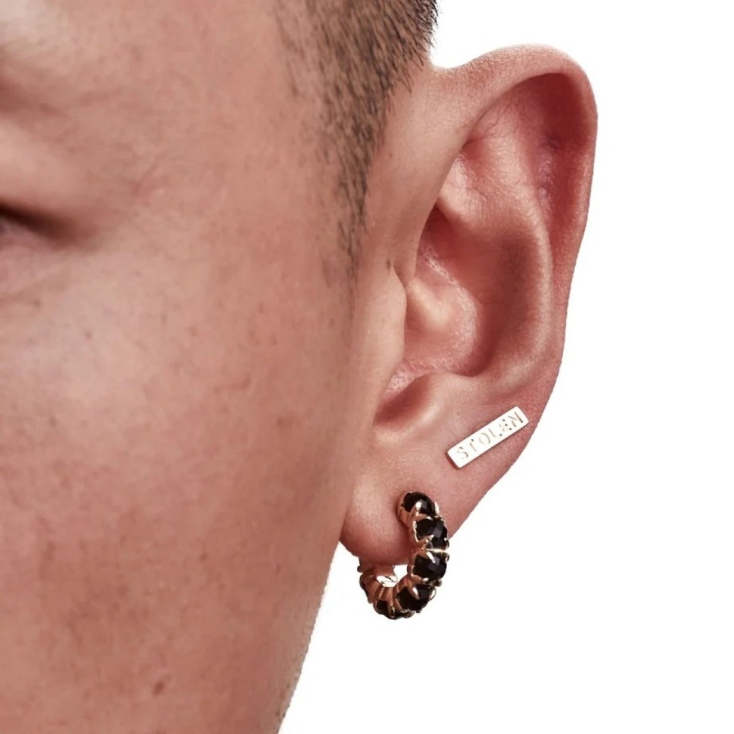 TINY STOLEN BAR EARRINGS - GOLD PLATED – Stolen Girlfriends Club Jewellery TINY STOLEN BAR EARRINGS - GOLD PLATED by Stolen Girlfriends Club Jewellery | Bar shaped earring with Stolen engraved with butterfly fastening