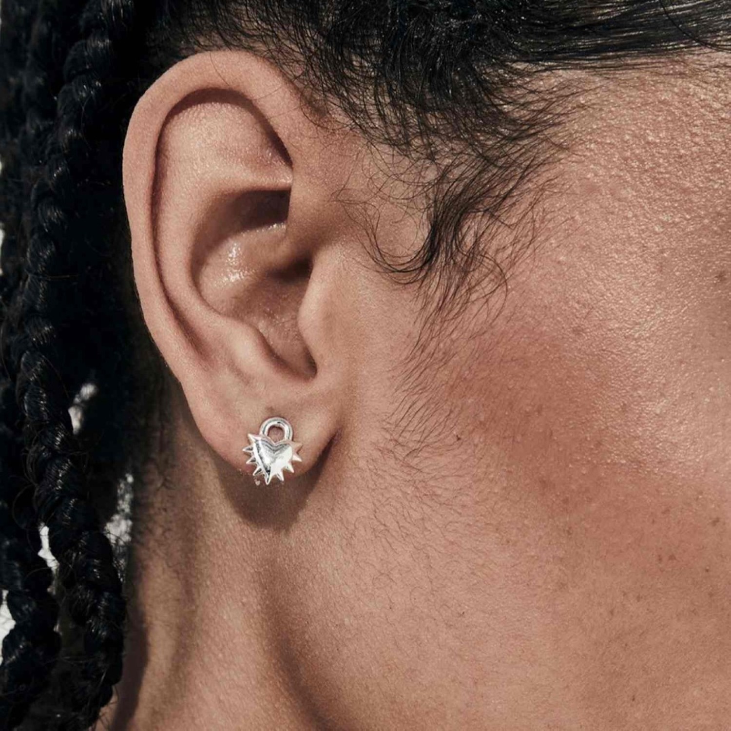 Love Locket Stud Earrings – Romantic Silver Heart Padlock Design Love Locket Stud Earrings by Stolen Girlfriends Club Jewellery | Silver heart-shaped padlock earrings with spikes and 'Stolen' engraving, featuring a polished finish.
