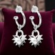Love Locket Anchor Stud Earrings – Romantic Silver Heart Padlock Design – Stolen Girlfriends Club Jewellery Love Locket Anchor Stud Earrings – Silver heart-shaped padlock earrings with spikes and 'Stolen' engraving, featuring a polished finish.