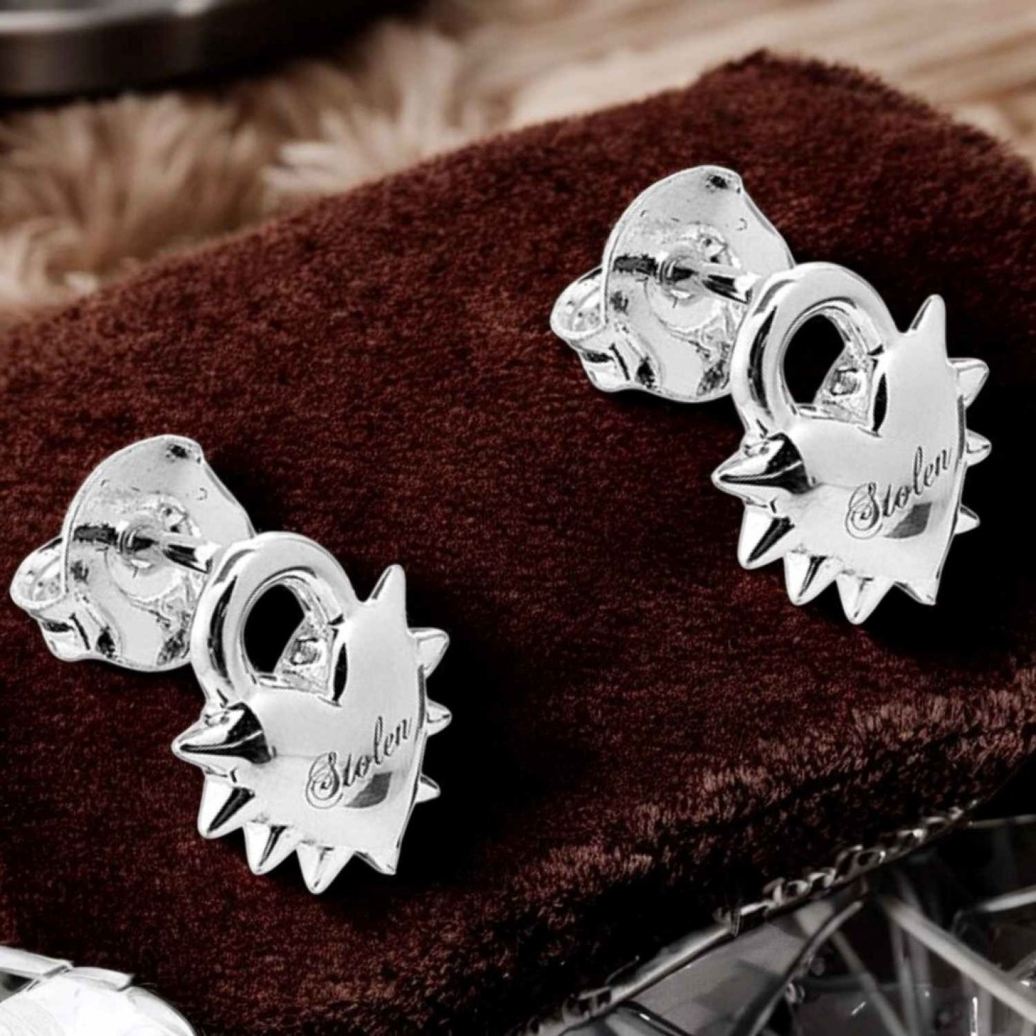 Love Locket Stud Earrings – Romantic Silver Heart Padlock Design Love Locket Stud Earrings by Stolen Girlfriends Club Jewellery | Silver heart-shaped padlock earrings with spikes and 'Stolen' engraving, featuring a polished finish.