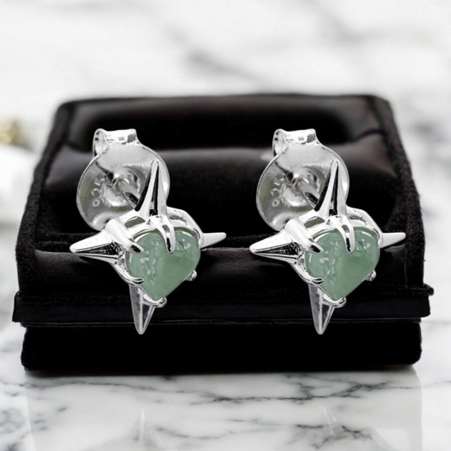 PRECIOUS PUNK STUD EARRINGS – Sterling Silver with Green Amethyst PRECIOUS PUNK STUD EARRINGS by Stolen Girlfriends Club, crafted in sterling silver with bold green amethyst stones in a sleek, modern stud design.