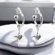 PRECIOUS PUNK ANCHOR EARRINGS – Sterling Silver Hoops with Green Amethyst Heart Charms PRECIOUS PUNK ANCHOR EARRINGS by Stolen Girlfriends Club, featuring heart-shaped green amethyst stones suspended on polished sterling silver hoops with butterfly fastenings.