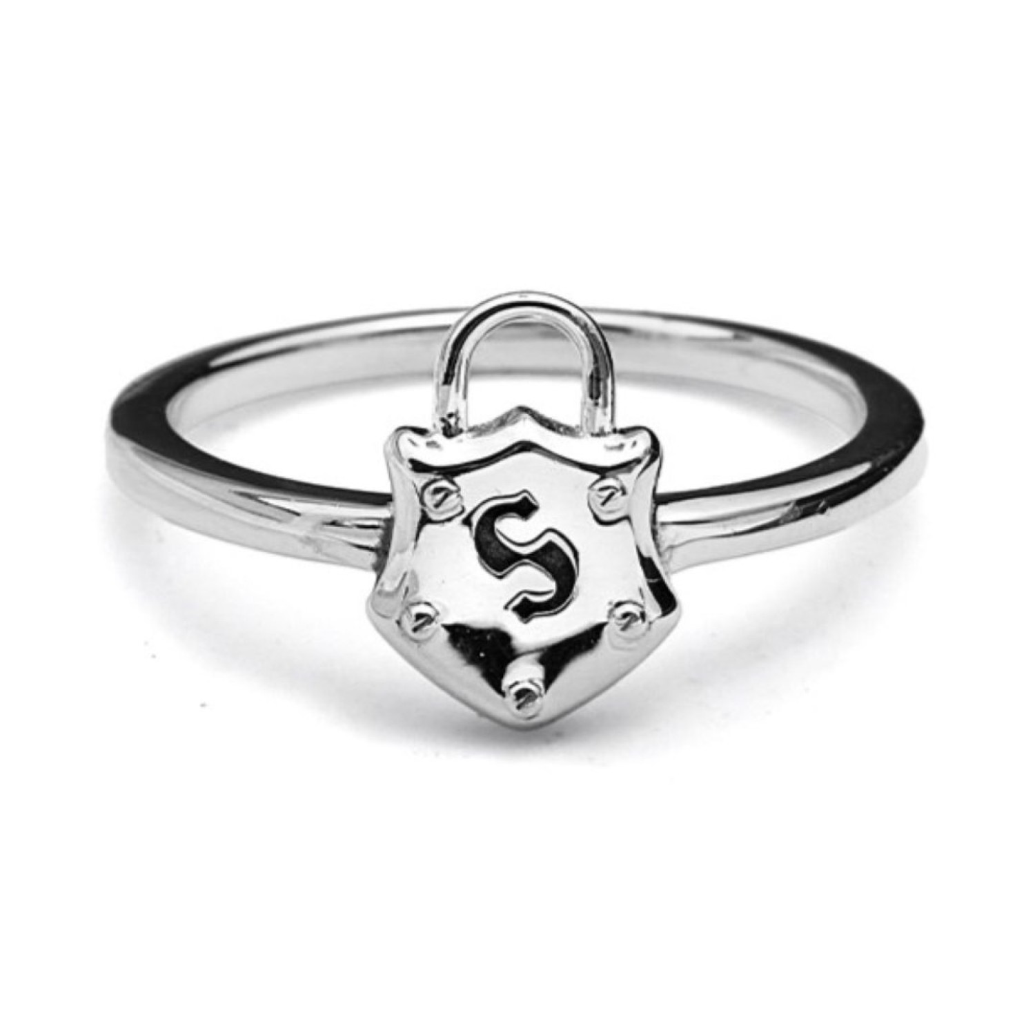 Shield Ring by Stolen Girlfriends Club – Sterling Silver Elegance with Shield Charm SHIELD RING – Stolen Girlfriends Club Jewellery | Shield Ring by Stolen Girlfriends Club, featuring a narrow sterling silver band and a shield charm engraved with the iconic 'S' logo.