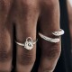Shield Ring by Stolen Girlfriends Club – Sterling Silver Elegance with Shield Charm SHIELD RING – Stolen Girlfriends Club Jewellery | Shield Ring by Stolen Girlfriends Club, featuring a narrow sterling silver band and a shield charm engraved with the iconic 'S' logo.