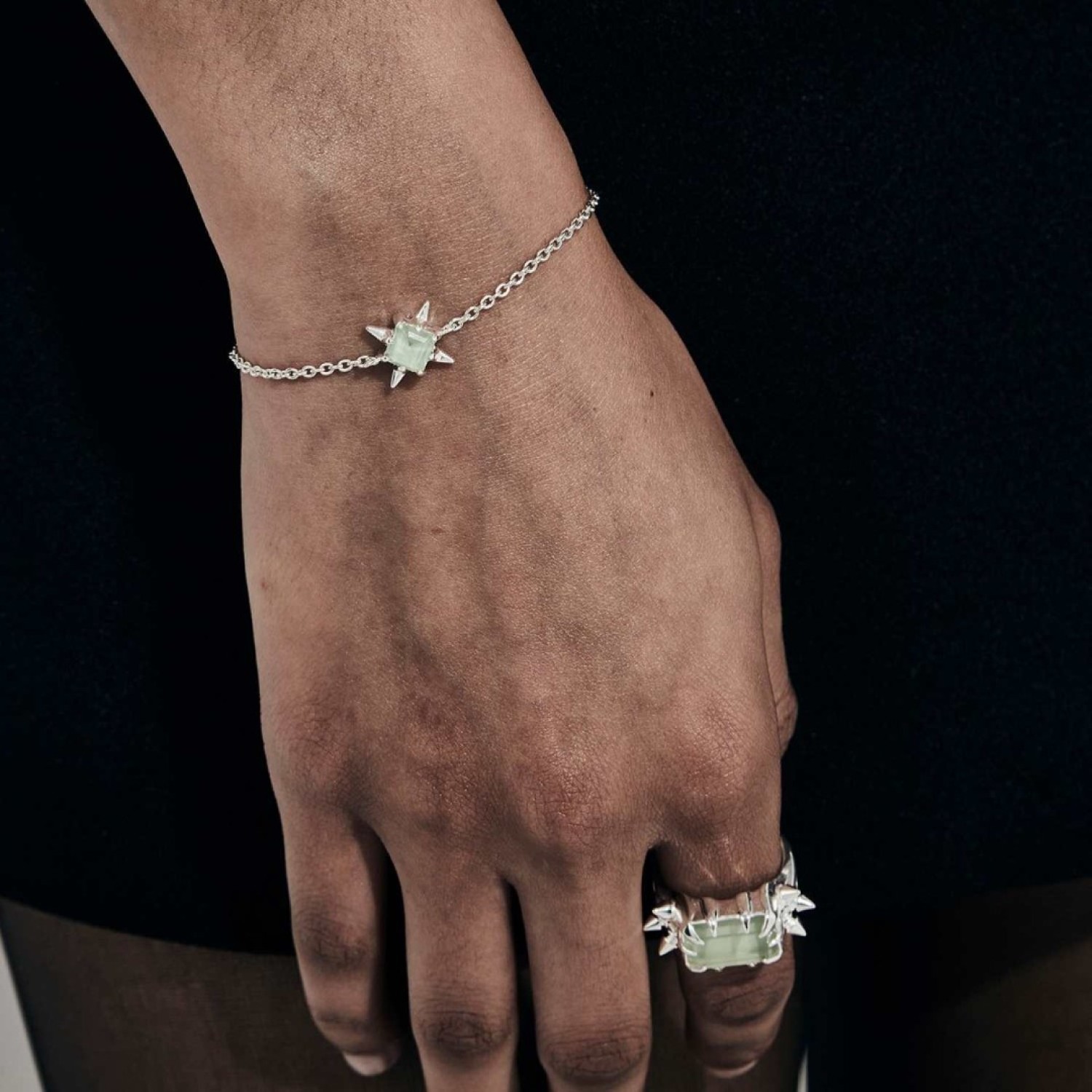 PRECIOUS PUNK BRACELET – Green Amethyst and Sterling Silver by Stolen Girlfriends Club PRECIOUS PUNK BRACELET by Stolen Girlfriends Club, featuring a delicate silver cable chain with a square-cut natural green amethyst stone set in a bold sterling silver charm. Includes a lobster clasp and a small circular tag for added detail.
