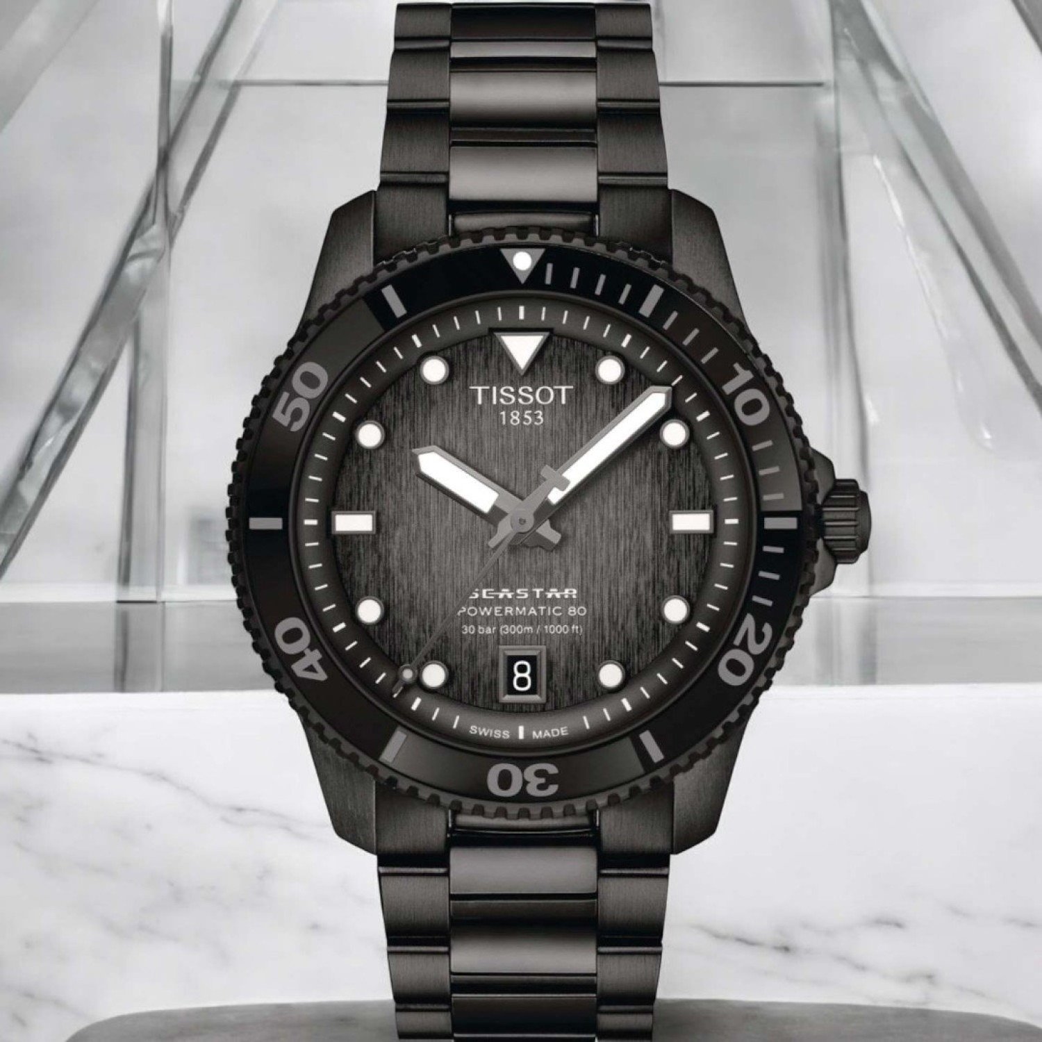Christies Jewellery - Tissot Seastar 1000 Powermatic GMT 40MM T1208073305100 Auckland NZ Tissot Seastar 1000 Powermatic GMT 40MM T1208073305100 watch with black PVD-coated stainless steel case and graded grey-black dial.