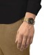 Christies Jewellery - Tissot Seastar 1000 Quartz GMT T1208522205100 Auckland NZ Tissot Seastar 1000 Quartz GMT T1208522205100 with two-tone gold and silver stainless steel casing, black dial, and black-brown bezel