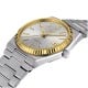 Tissot PRX Powermatic 80 18K Gold Bezel 40mm T9314074103101 by Tissot Watches NZ | TISSOT PRX Powermatic 80 wristwatch featuring a stainless steel bracelet, a silver dial, and a yellow gold bezel. Includes sleek hour markers, gold hands, and a date window
