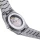 Tissot PRX Powermatic 80 18K Gold Bezel 40mm T9314074103101 by Tissot Watches NZ | TISSOT PRX Powermatic 80 wristwatch featuring a stainless steel bracelet, a silver dial, and a yellow gold bezel. Includes sleek hour markers, gold hands, and a date window