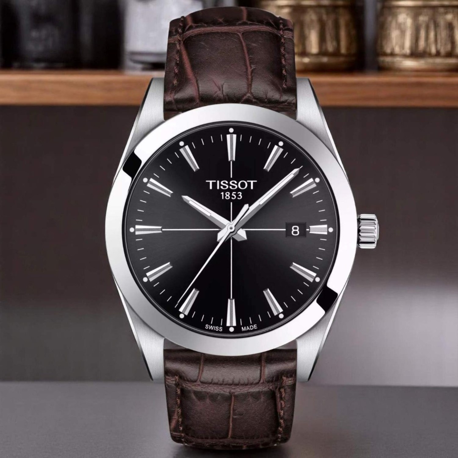 Tissot Gentleman T1274101605101 – Timeless Elegance with Black Dial and Brown Leather Strap Tissot Gentleman T1274101605101 wristwatch with a black dial, silver markers, and brown leather strap – by Tissot Watches NZ.