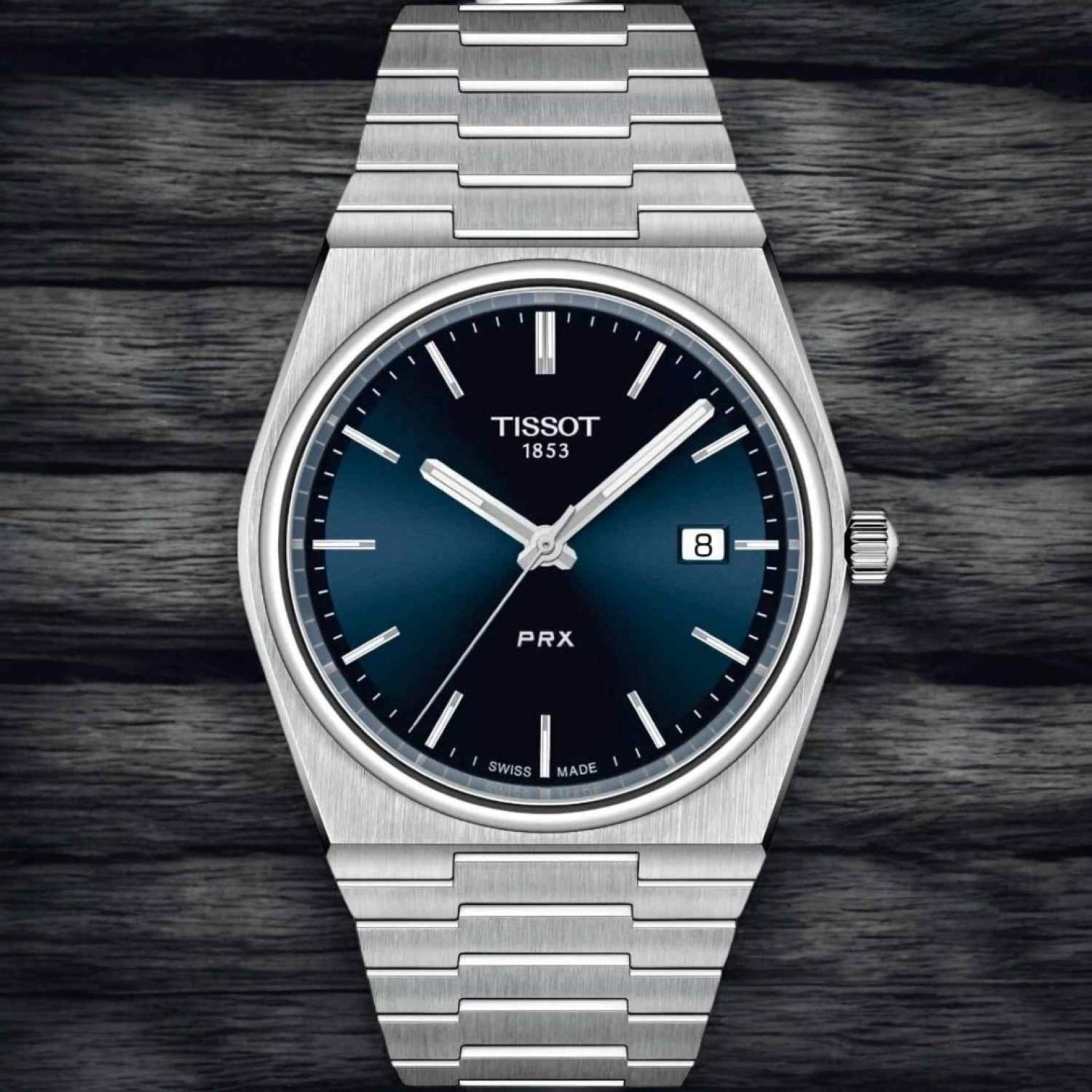 TISSOT PRX T-Classic Stainless Steel Watch T1374101104100. A throwback to a flagship design from 1978, the PRX 40 205 is an essential timepiece with integrated case and bracelet. Made remarkable by its slim, timeless and solid design, this is an ideal wat
