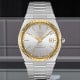 Tissot PRX Powermatic 80 18K Gold Bezel 40mm T9314074103101 by Tissot Watches NZ | TISSOT PRX Powermatic 80 wristwatch featuring a stainless steel bracelet, a silver dial, and a yellow gold bezel. Includes sleek hour markers, gold hands, and a date window