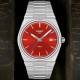 Tissot PRX Red Dial 40mm T1374101142100 – Tissot Watches NZ Tissot PRX Red Dial 40mm T1374101142100 by Tissot Watches NZ | Red Tissot PRX wristwatch with a stainless steel dial, silver hour markers, a date window at 3 o'clock, and 'PRX' elegantly inscribed above the 6 o'clock position.