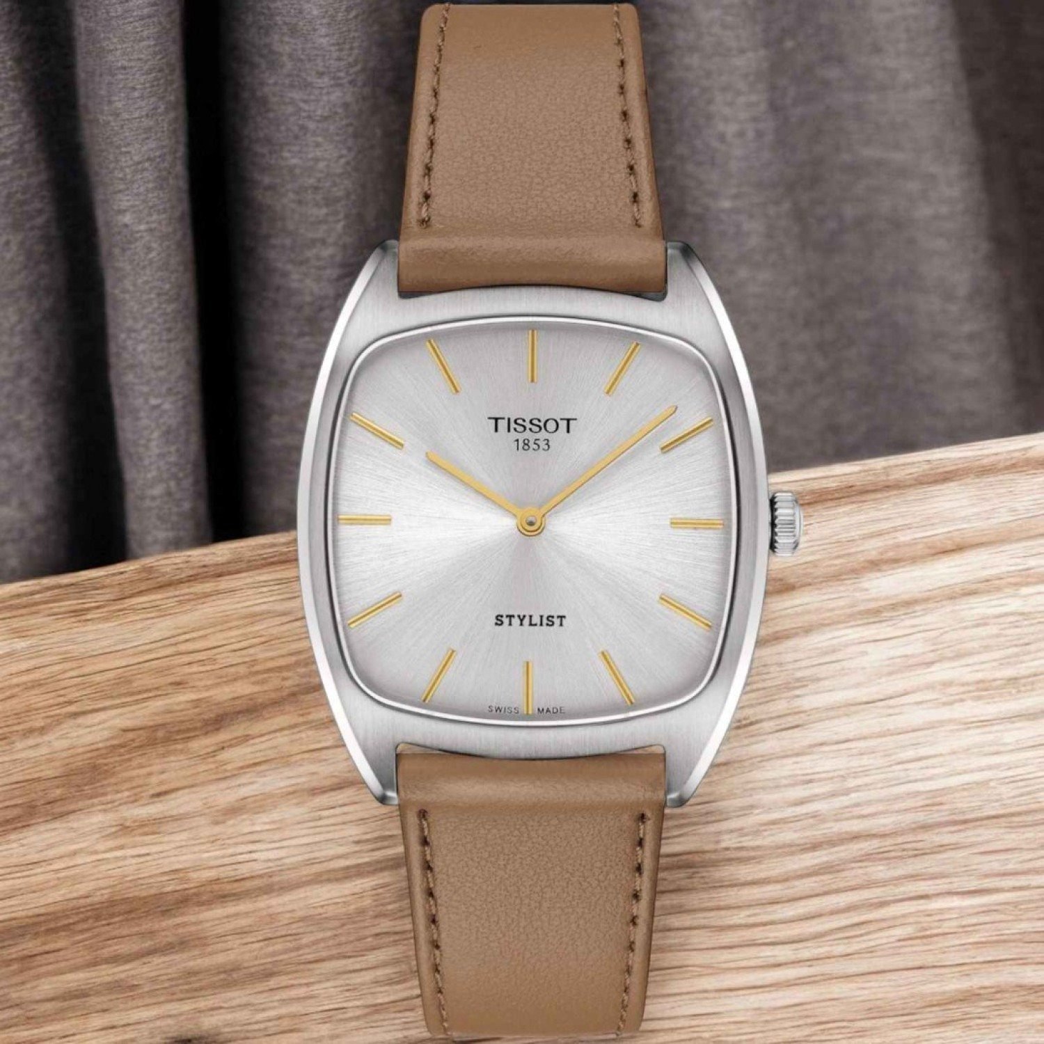 Christies Jewellery - Tissot Stylist Silver Dial Leather Strap Watch T1599091603100 Auckland NZ Tissot Stylist Silver Dial Leather Strap Watch T1599091603100 T159.909.16.031.00 with gold hands and markings on dial