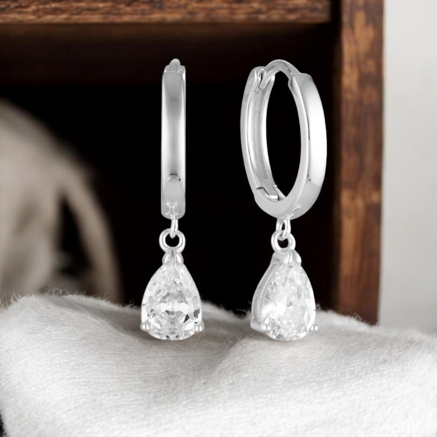 Christies Jewellery - Georgini Pia Silver Hoop Earrings IE935W Auckland NZ Georgini Pia Silver Hoop Earrings IE935W with Pear Shaped CZ Dangle.