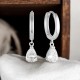 Christies Jewellery - Georgini Pia Silver Hoop Earrings IE935W Auckland NZ Georgini Pia Silver Hoop Earrings IE935W with Pear Shaped CZ Dangle.