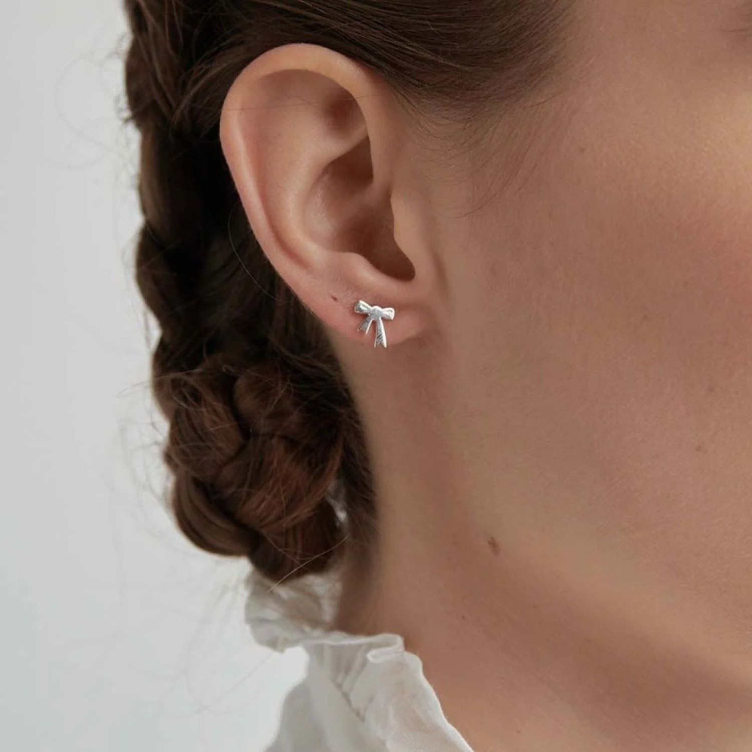 Karen Walker Mini Bow Silver Stud Earrings Karen Walker Mini Bow Studs in Sterling Silver