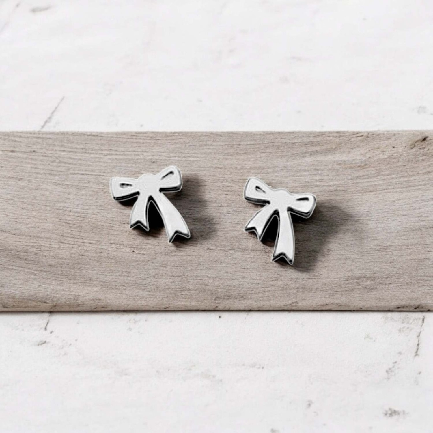 Karen Walker Mini Bow Silver Stud Earrings Karen Walker Mini Bow Studs in Sterling Silver