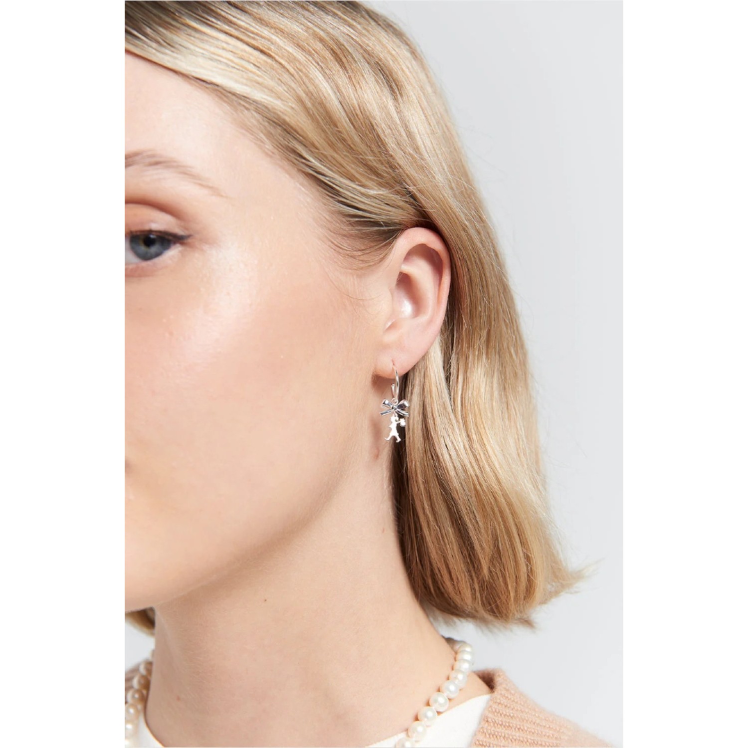 Karen Walker Sterling Silver Mini Girl with a Bow Hoops Karen Walker Mini Girl with a Bow Hoop Earrings in sterling silver