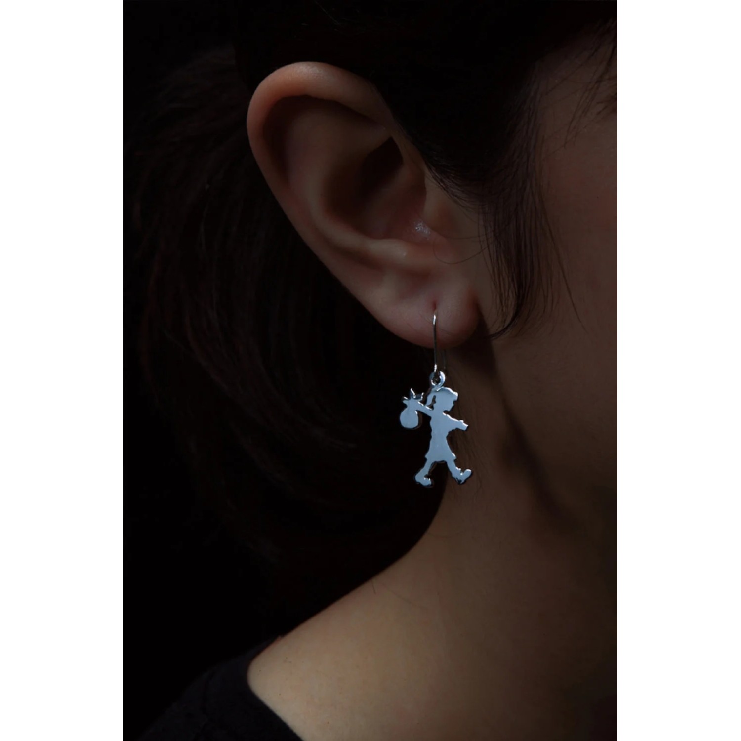 Karen Walker Sterling Silver Runaway Girl Earrings Karen Walker Runaway Girl Earrings in sterling silver iconic motif design
