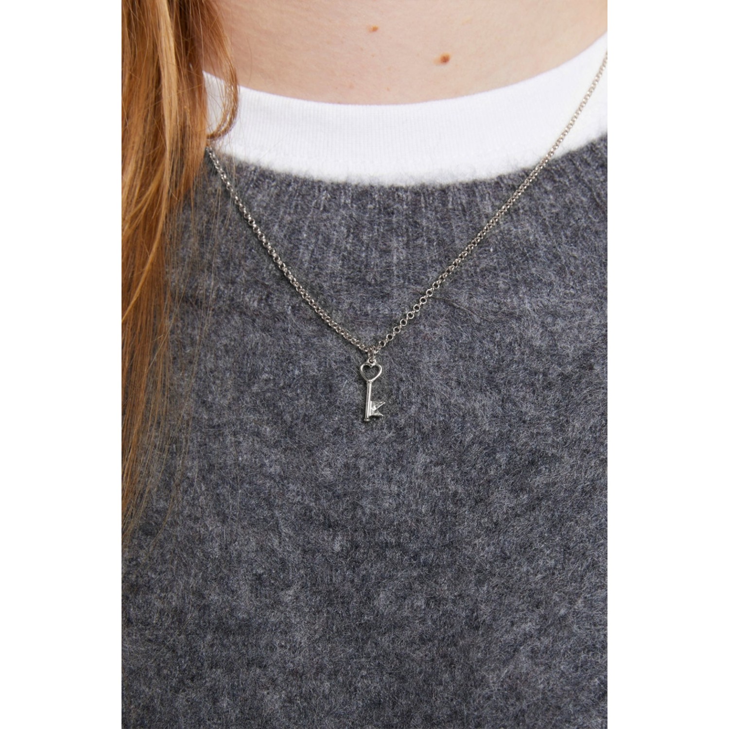 Karen Walker Monogram Key Necklace in sterling silver with heart-shaped key pendant